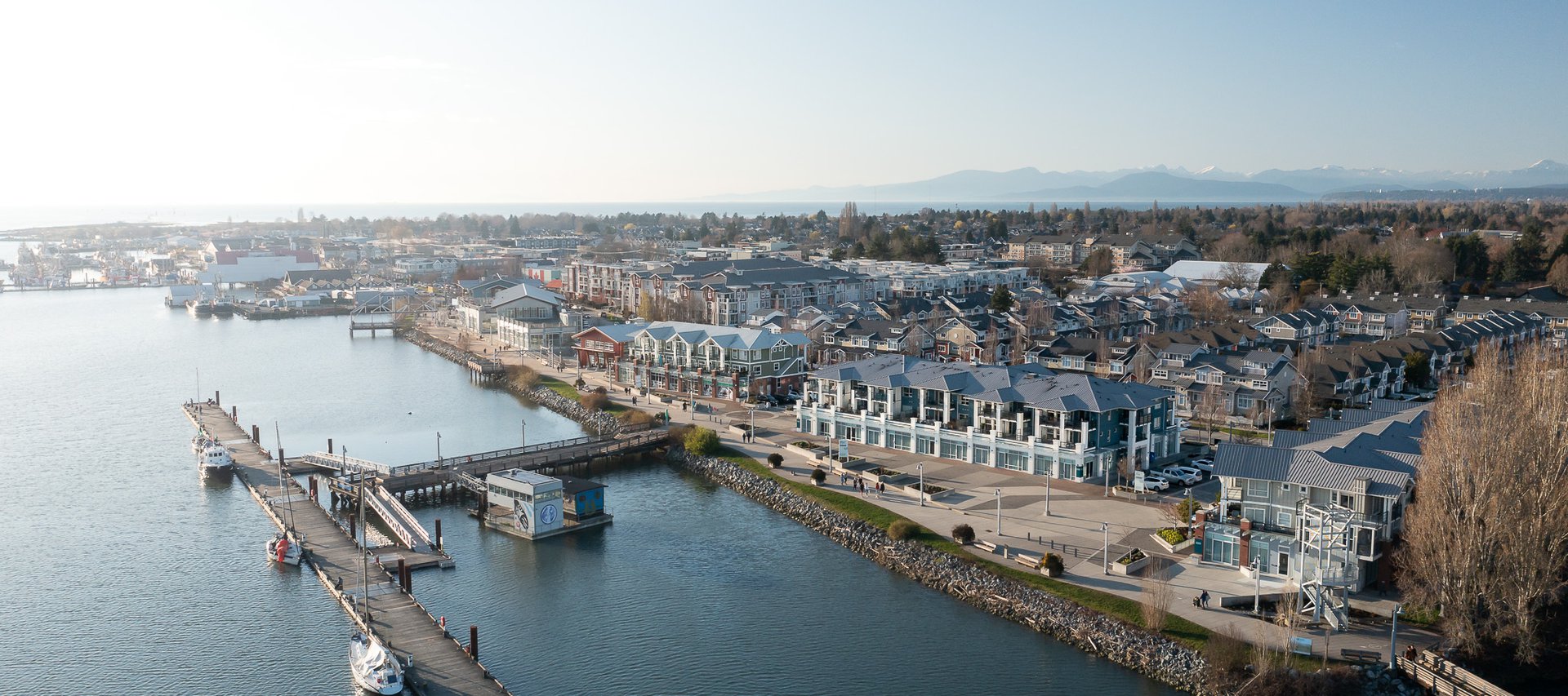 drone shot of steveston waterfront hotel located in steveston village by the waterfront