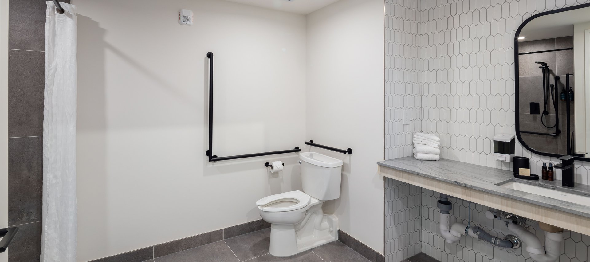 accessible studio modern bathroom with locally handmade amenities from fern & petal